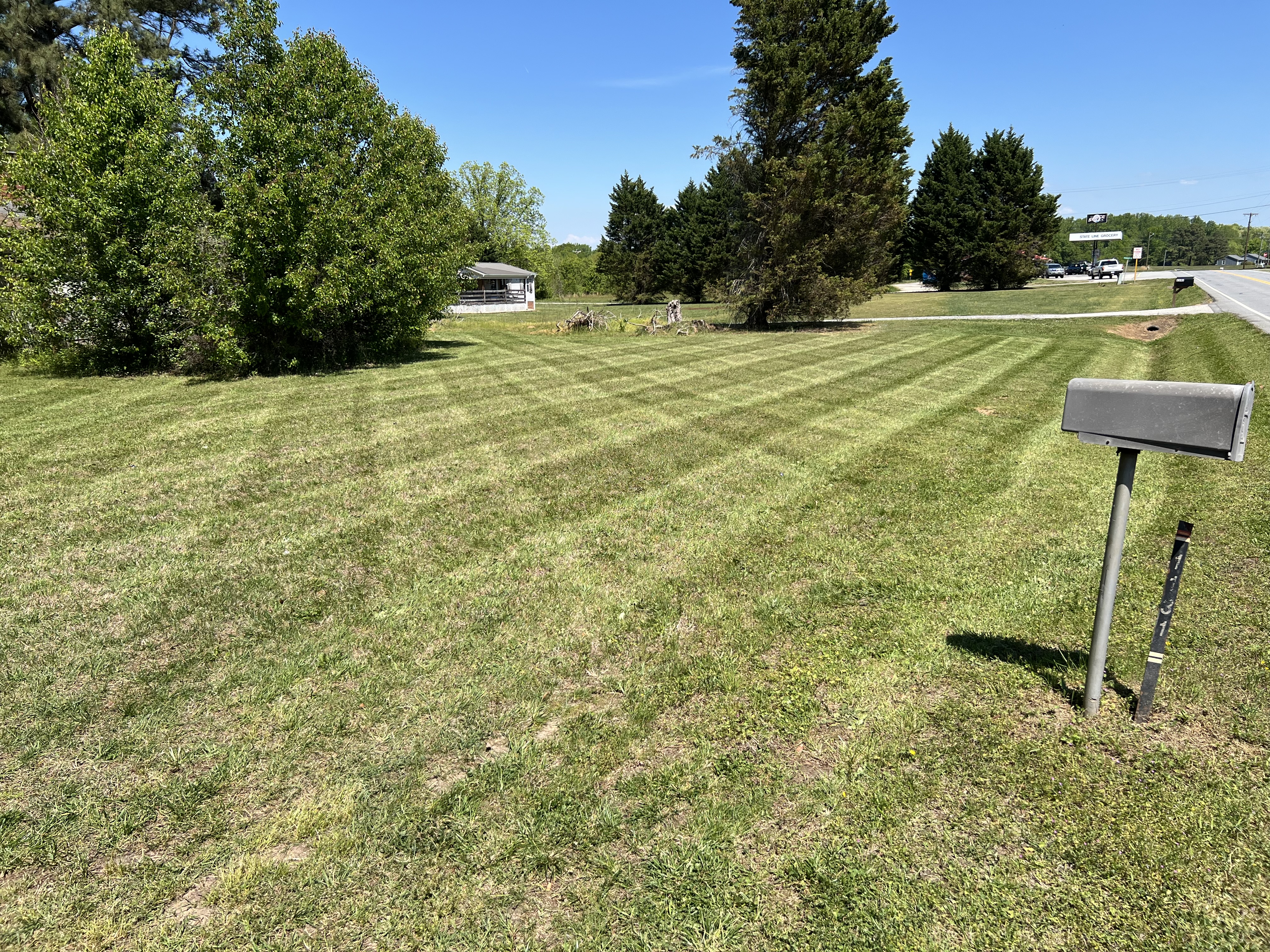 Fresh cut — large open lot with mowing stripes